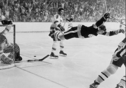 Bobby Orr scores to win the Stanley Cup